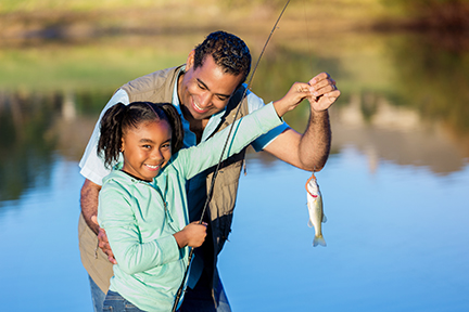 Young fisher shows off catch Young fisher shows off catch