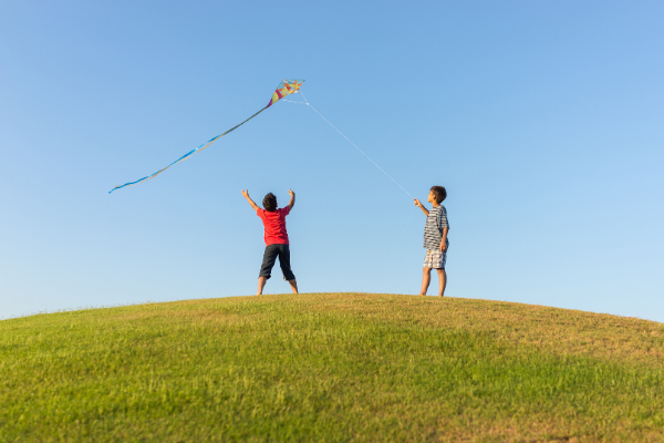 Kids flying kite