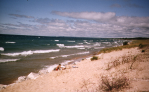 Sandy beach with waves on Lake Michigan's north shore Sandy beach with waves on Lake Michigan's north shore