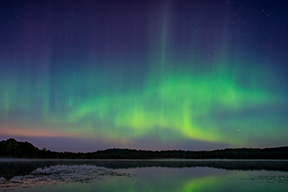 The northern lights over a lake in Wisconsin The northern lights over a lake in Wisconsin