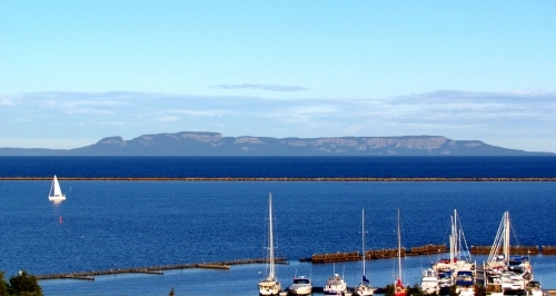 A photo of the stone mesa in Thunder Bay that looks like a giant sleeping on his back