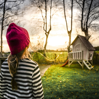 Girl looking at backyard