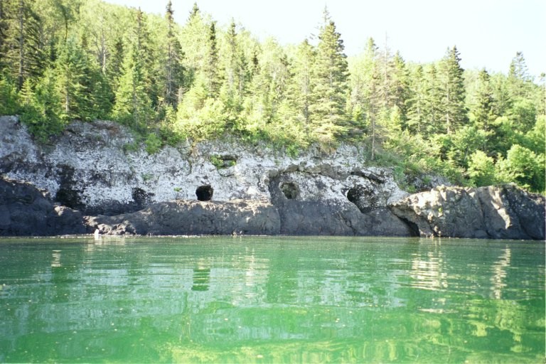 rocky cliffs on the shores of Isle Royale show the effects of prolonged wind and waves rocky cliffs on the shores of Isle Royale show the effects of prolonged wind and waves